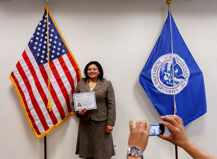 New U.S. citizen Rosa Singuenza poses for a photo after a naturalization ceremony at the new Salt Lake City, Utah office of the U.S. Citizenship and Immigration Services District Thursday, February 23, 2012. Photo by Trent Nelson/The Salt Lake Tribune