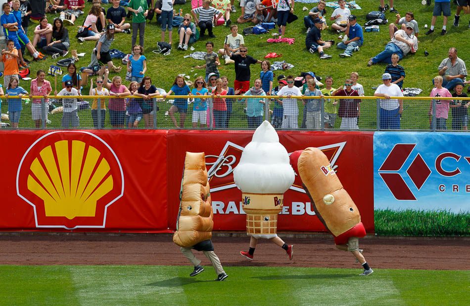 foot race between a slice of pizza, ice cream cone, and a hot dog